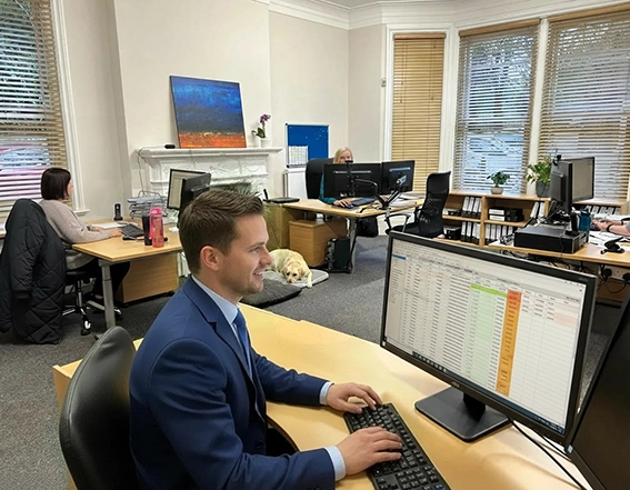 Staff busy working in the Mustard Accounts office.